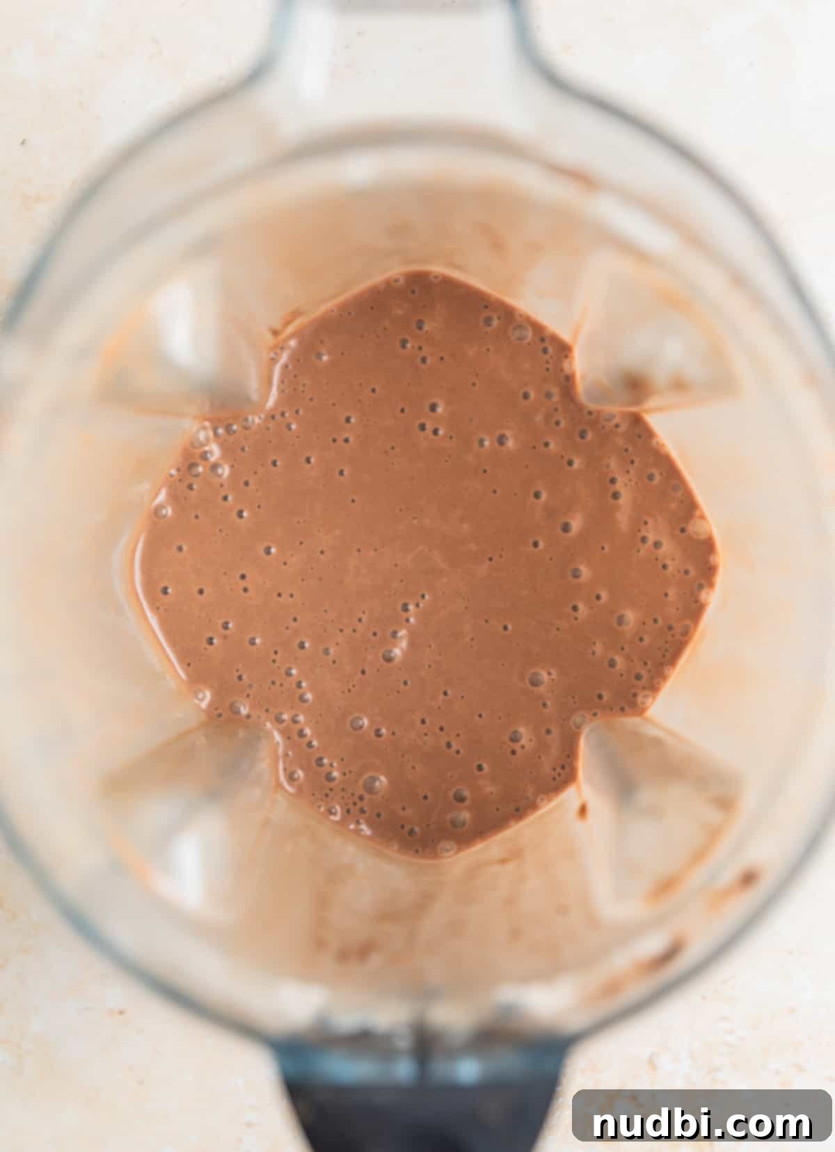 Peanut Butter Coffee Smoothie Recipe — Creamy Protein Boost 5 Blender containing peanut butter coffee smoothie.