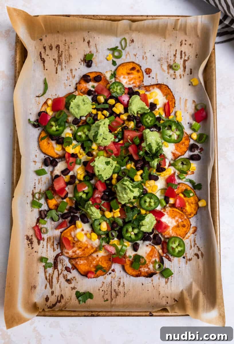 Sweet Potato Nachos with Creamy Avocado Sauce 8 Overhead view of sheet pan nachos.