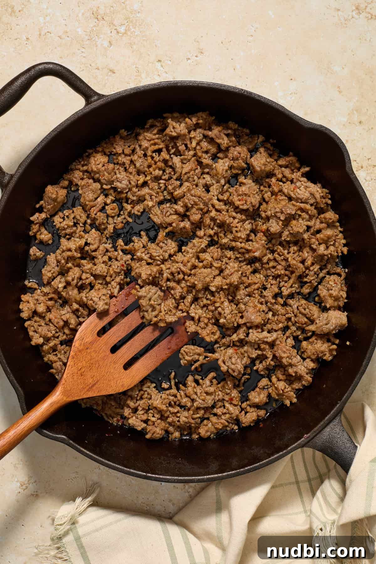 Sun-Dried Tomato Pasta with Italian Sausage Recipe 5 Italian sausage browned in cast iron skillet.