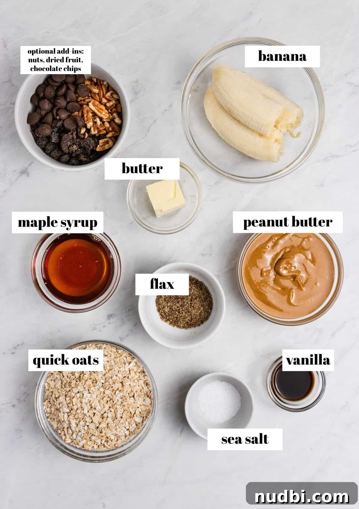 Peanut Butter Banana Oatmeal Breakfast Cookies That Keep You Full 4 Oats, banana, maple, butter and other ingredients labeled on counter.