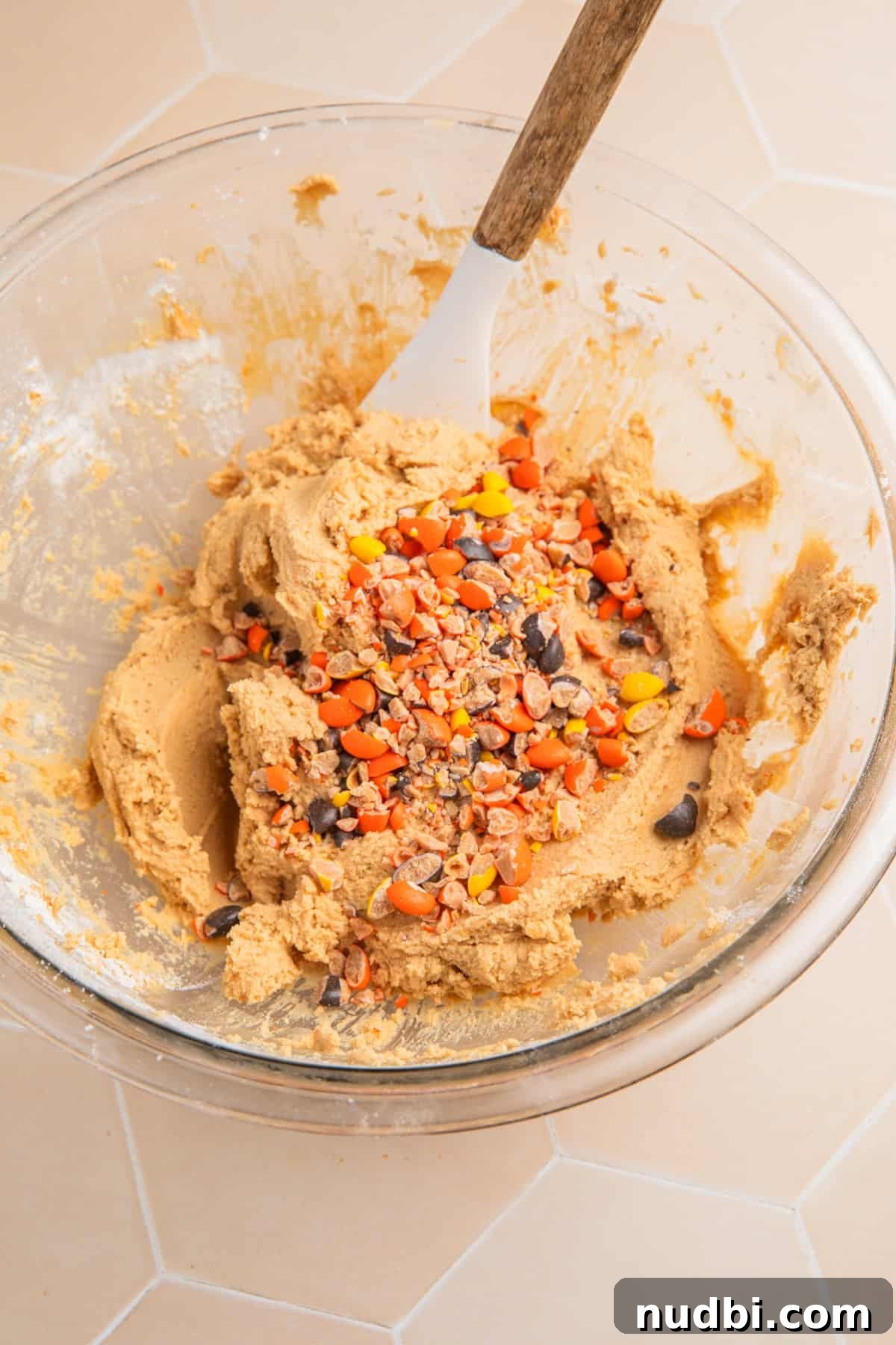 Edible Peanut Butter Cookie Dough Recipe for Safe Snacking 6 Crushed peanut butter candies added to cookie dough in bowl