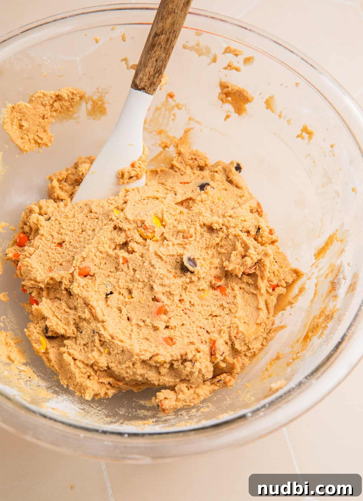Edible Peanut Butter Cookie Dough Recipe for Safe Snacking 7 Edible cookie dough with Reese's pieces candy mixed in.
