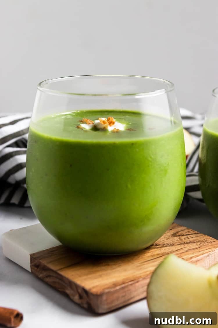 Apple Pie Smoothie Recipe: Creamy Green Spinach & Apple Blend 3 Apple green Smoothie in glass.