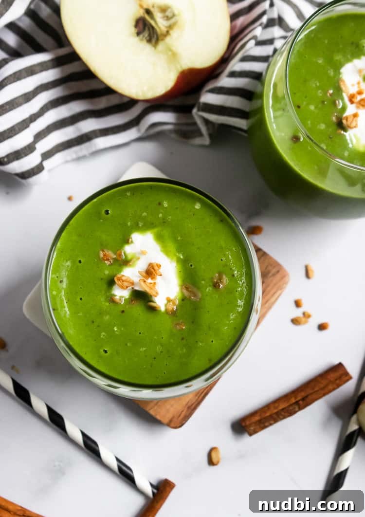 Apple Pie Smoothie Recipe: Creamy Green Spinach & Apple Blend 5 Apple Green Smoothie with dollop of yogurt and granola.