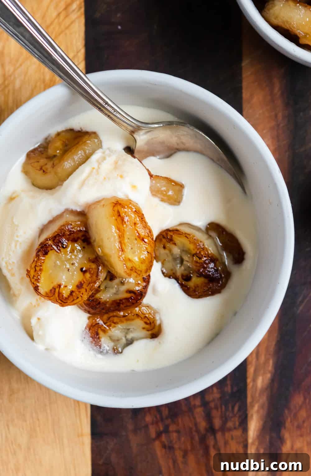 Maple Fried Bananas in 5 Minutes — Quick Breakfast or Dessert 4 Maple Fried Bananas over ice cream.