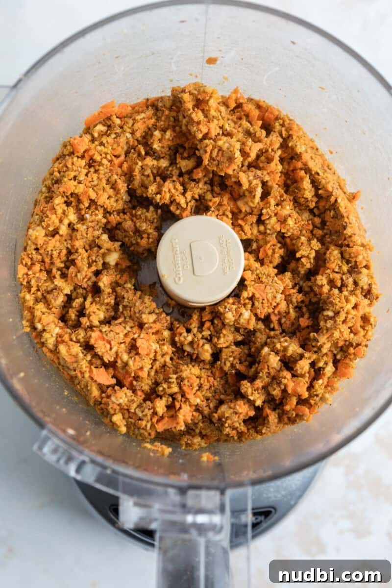 Carrot Cake Bites Recipe: Moist Mini Carrot Cake Balls 5 Ground carrots, pecan and almonds in food processor.