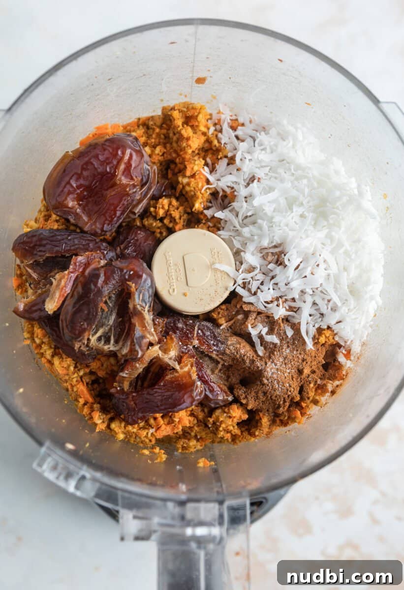 Carrot Cake Bites Recipe: Moist Mini Carrot Cake Balls 6 Coconut, cinnamon and medjool dates added to food processor.