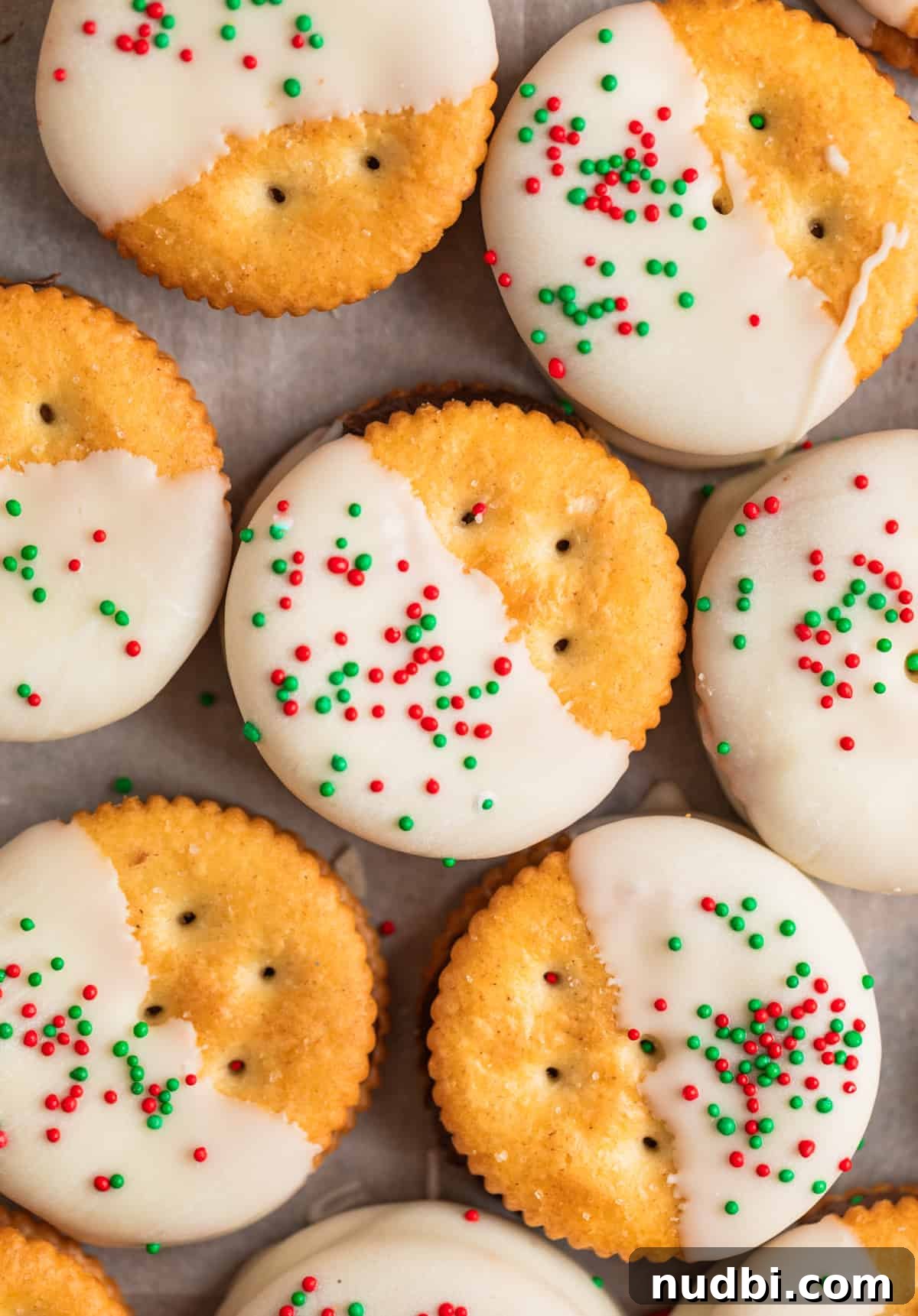 White Chocolate-Dipped Nutella Ritz Cracker Cookies 10 White chocolate dipped crackers with holiday sprinkles.