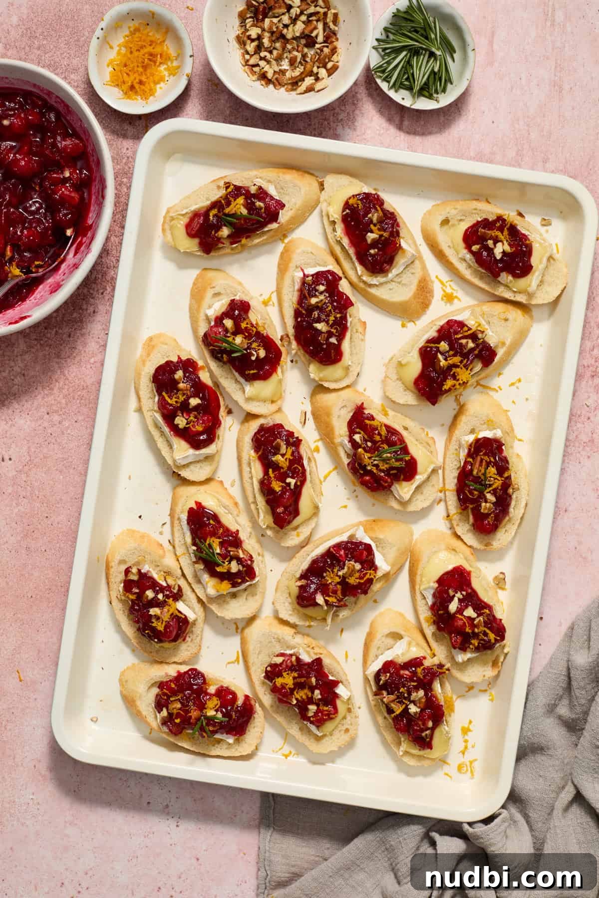 Cranberry Brie Crostini Recipe for Holiday Appetizers 9 Sheetpan with cranberry brie crostini prepped.