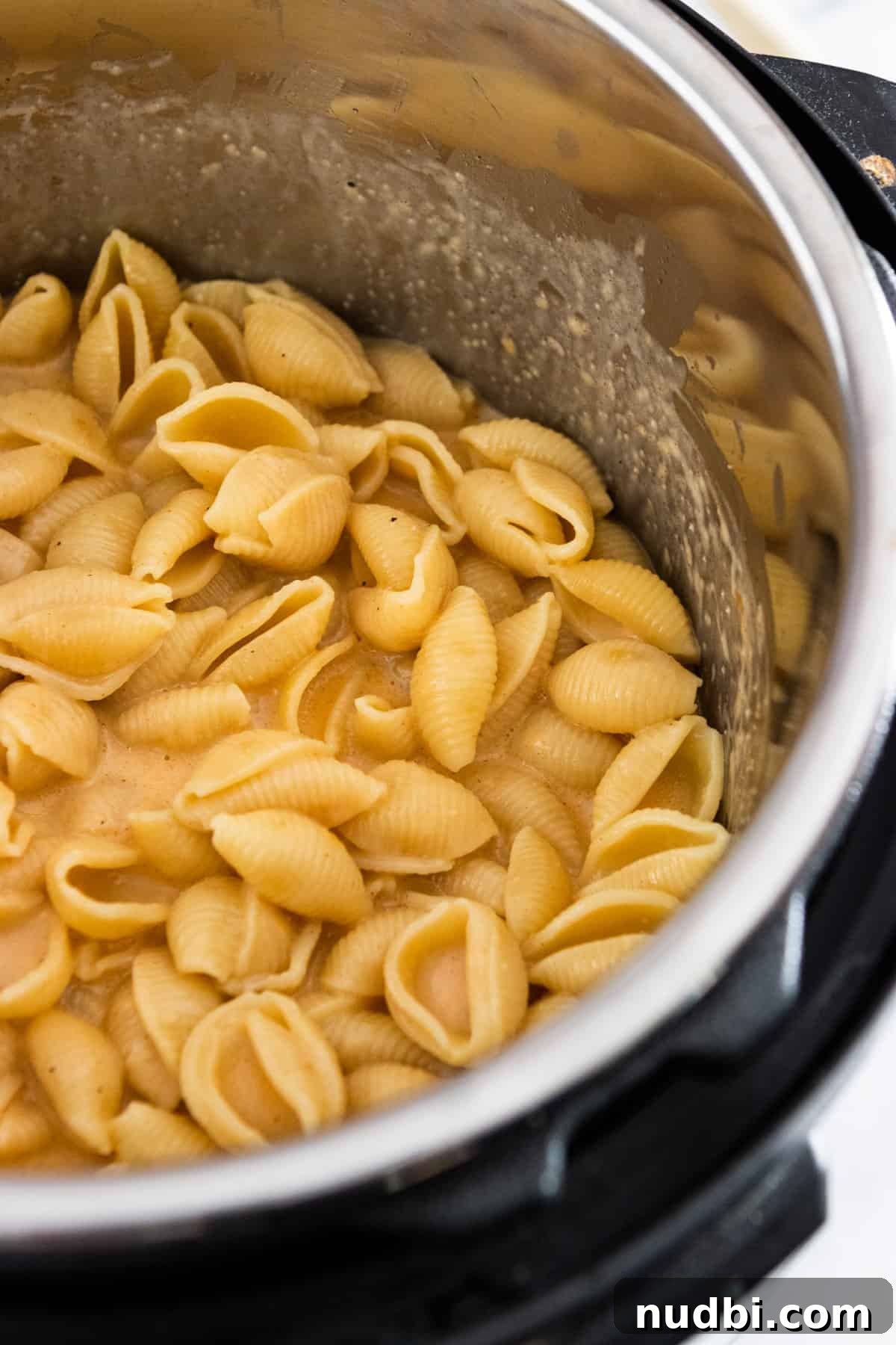 Creamy Instant Pot Mac and Cheese in 15 Minutes 5 Macaroni and cheese in pressure cooker pot.