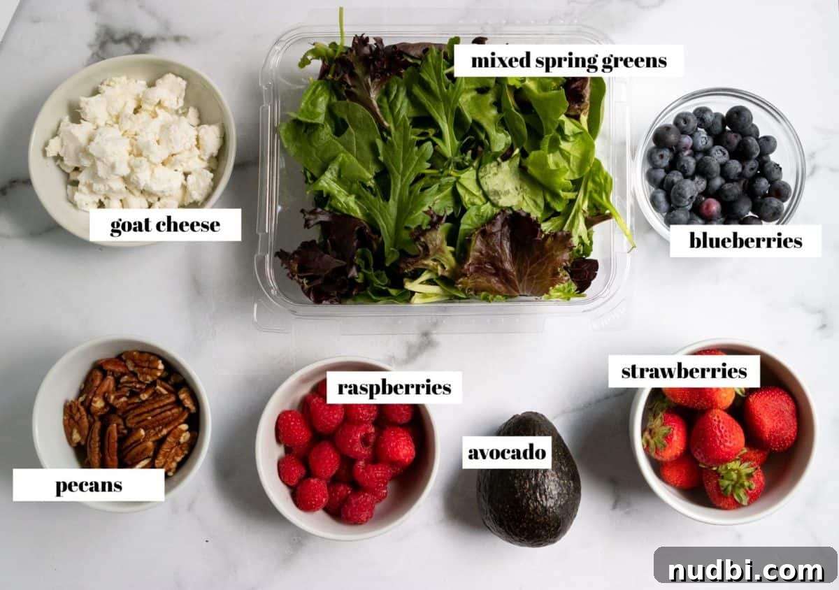 Mixed Greens with Berries and Strawberry Balsamic Dressing 3 Recipe ingredients labeled on white counter top.
