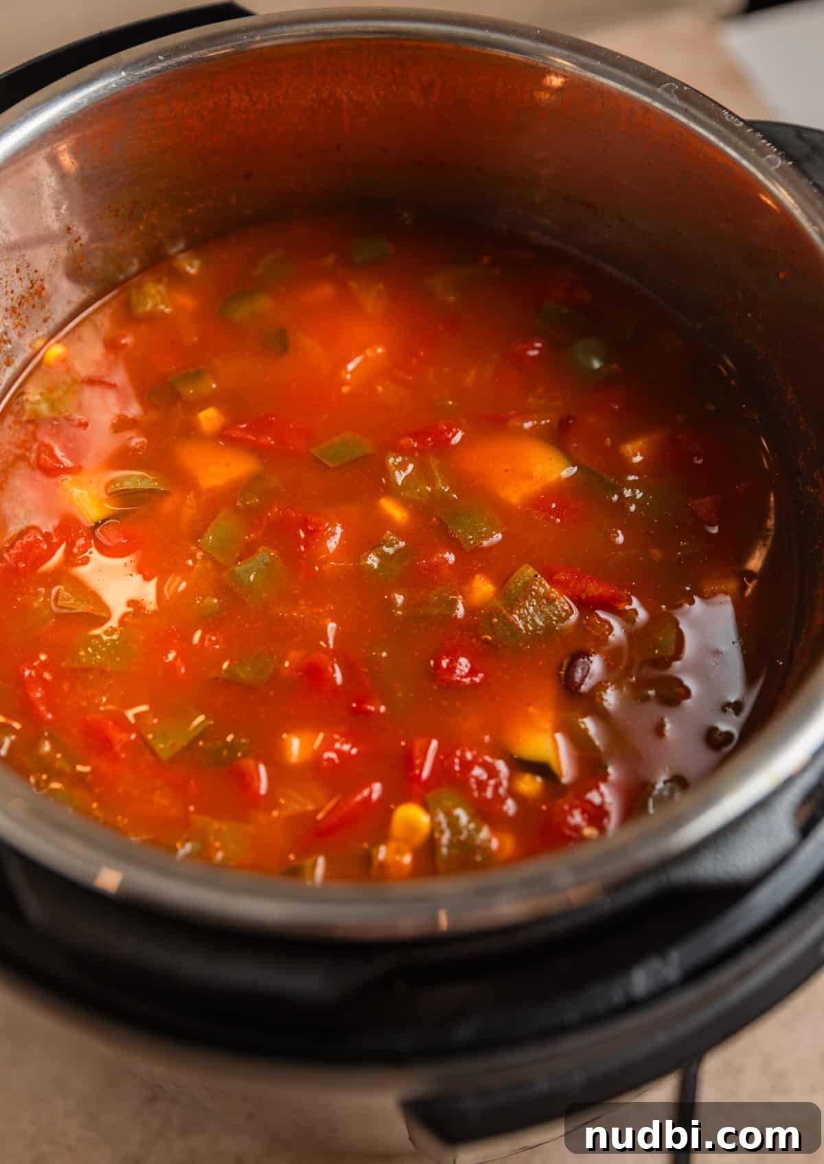 Instant Pot Chicken Tortilla Soup Recipe 7 Chicken tortilla soup in Instant Pot after pressure cooking.