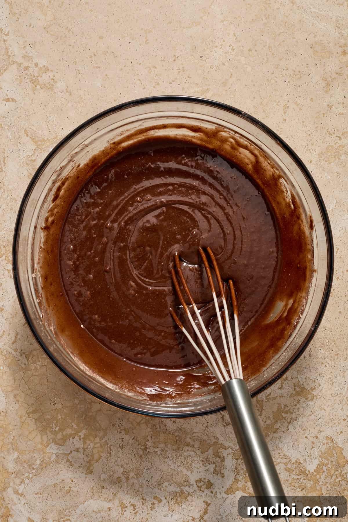 Kahlúa Cream Cheese Brownies Recipe — Luscious Coffee-Chocolate Swirl 4 Brownie mix in glass bowl with whisk.
