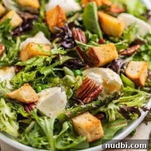 Spring Green Burrata Salad with Lemon Herb Vinaigrette 15 Green salad with burrata, sourdough croutons, pecans, peas and topped with citrus dressing.