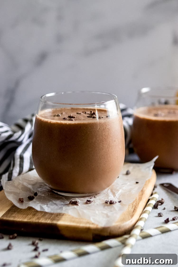 Chocolate Banana Smoothie with a Kick of Cayenne 5 Chocolate Banana Smoothie in glass.