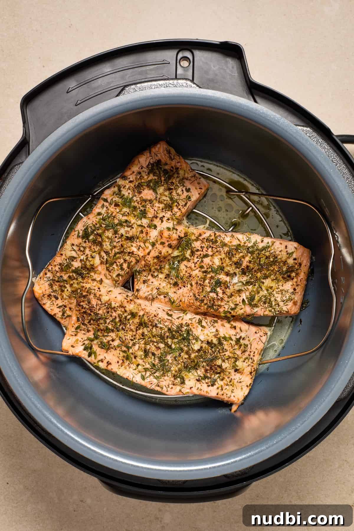 Instant Pot Butter Herb Salmon Recipe for Tender, Flaky Fish 7 Instant pot salmon after cooking.