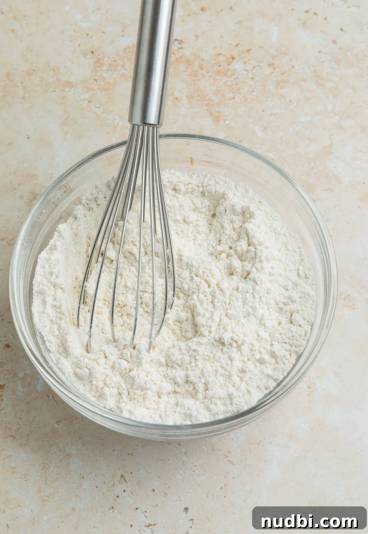 Zesty Lemon Sugar Cookies Recipe for Soft, Crispy Cookies 5 Dry ingredients whisked together in small bowl.