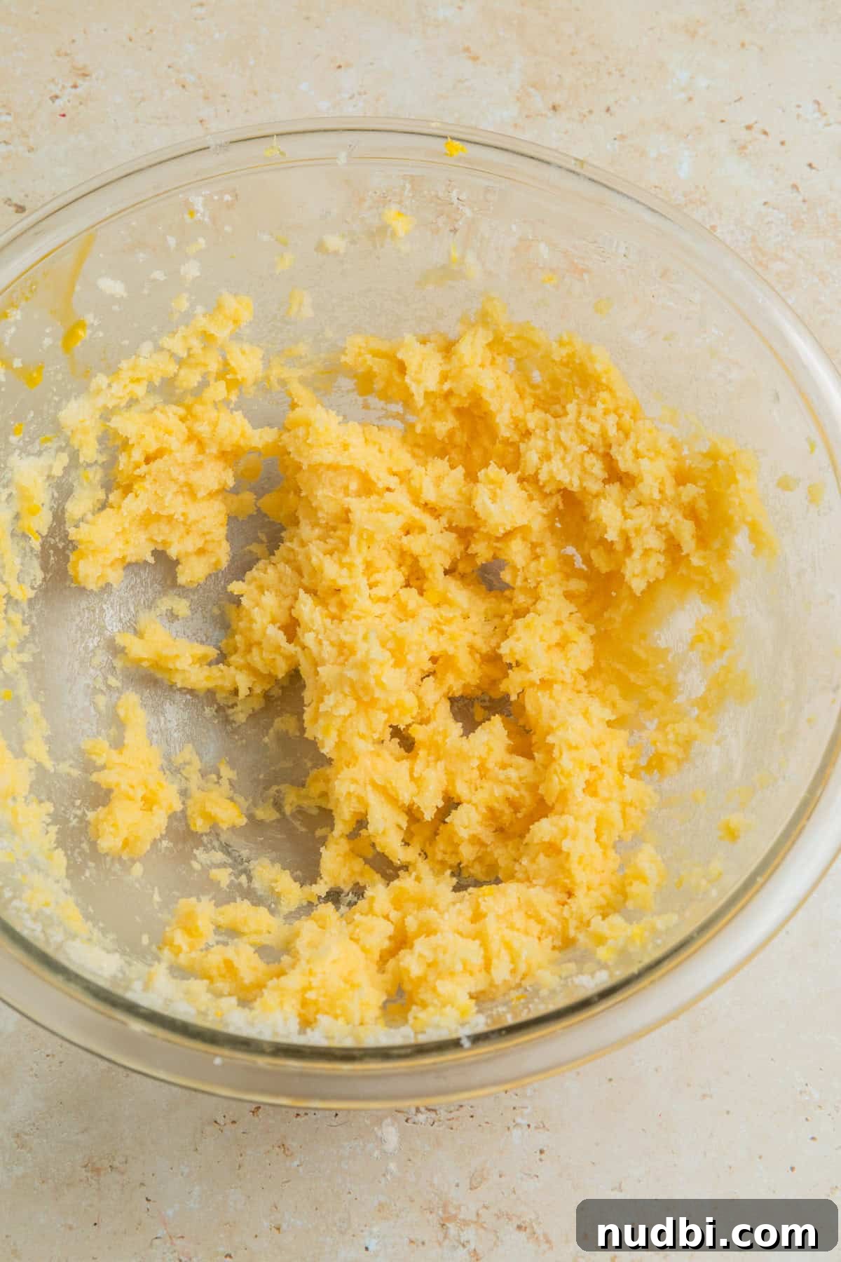 Zesty Lemon Sugar Cookies Recipe for Soft, Crispy Cookies 7 Lemon zest, vanilla and egg yolk mixed into creamed butter and sugar.