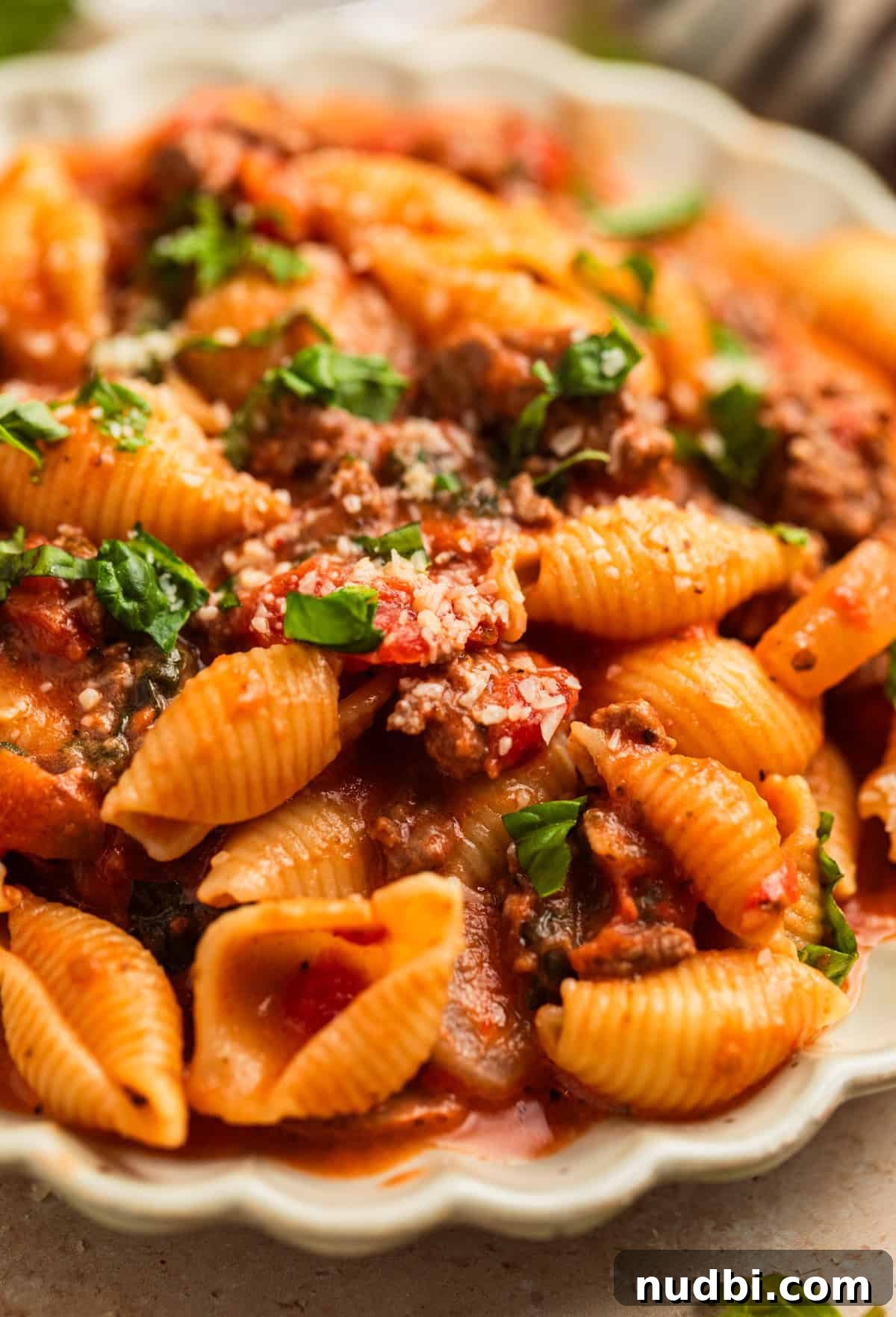 One-Skillet Ground Beef Pasta Skillet Meal 3 Ground beef pasta in dish with parmesan on top.