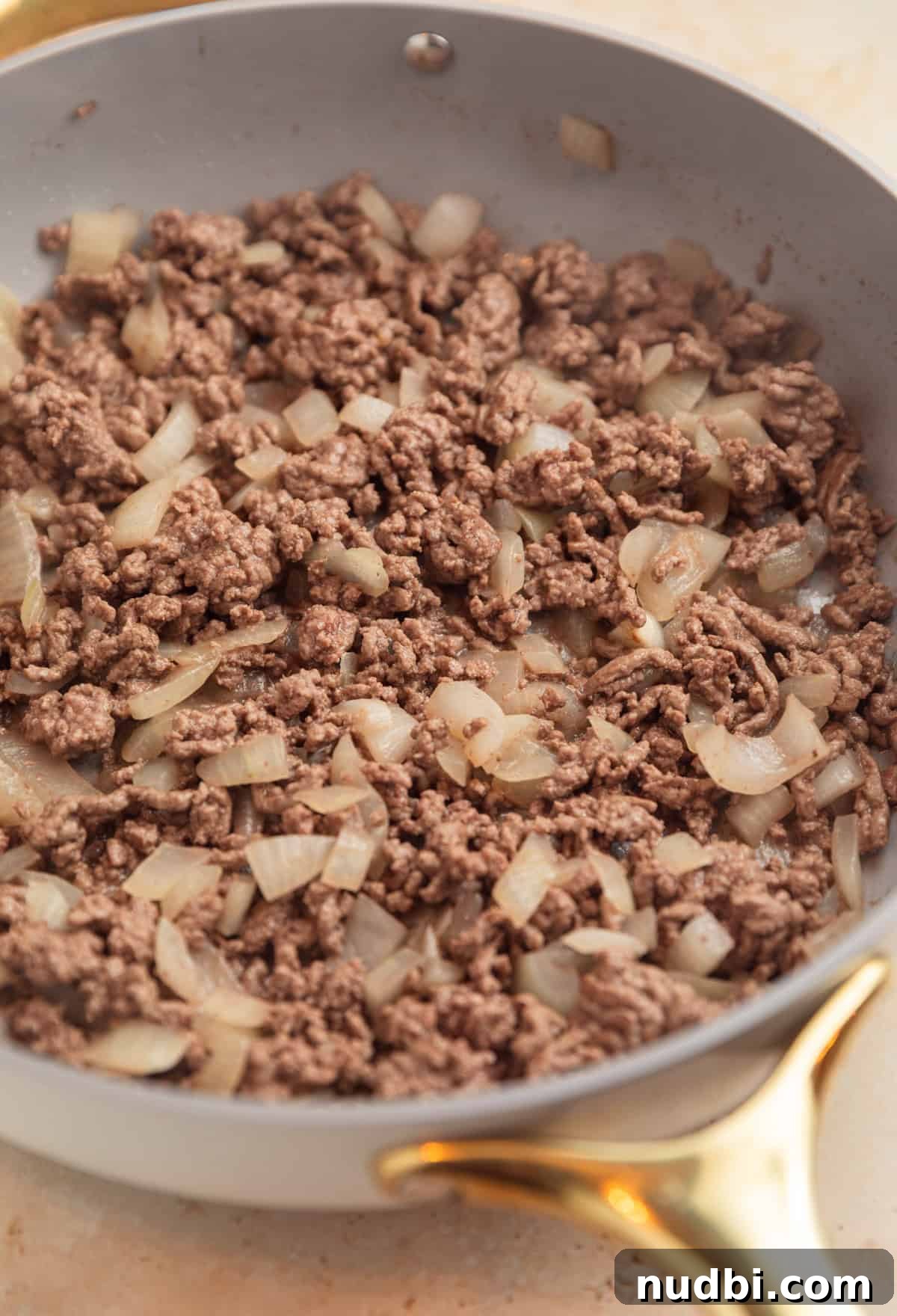 One-Skillet Ground Beef Pasta Skillet Meal 4 Ground beef browned in skillet with onions.