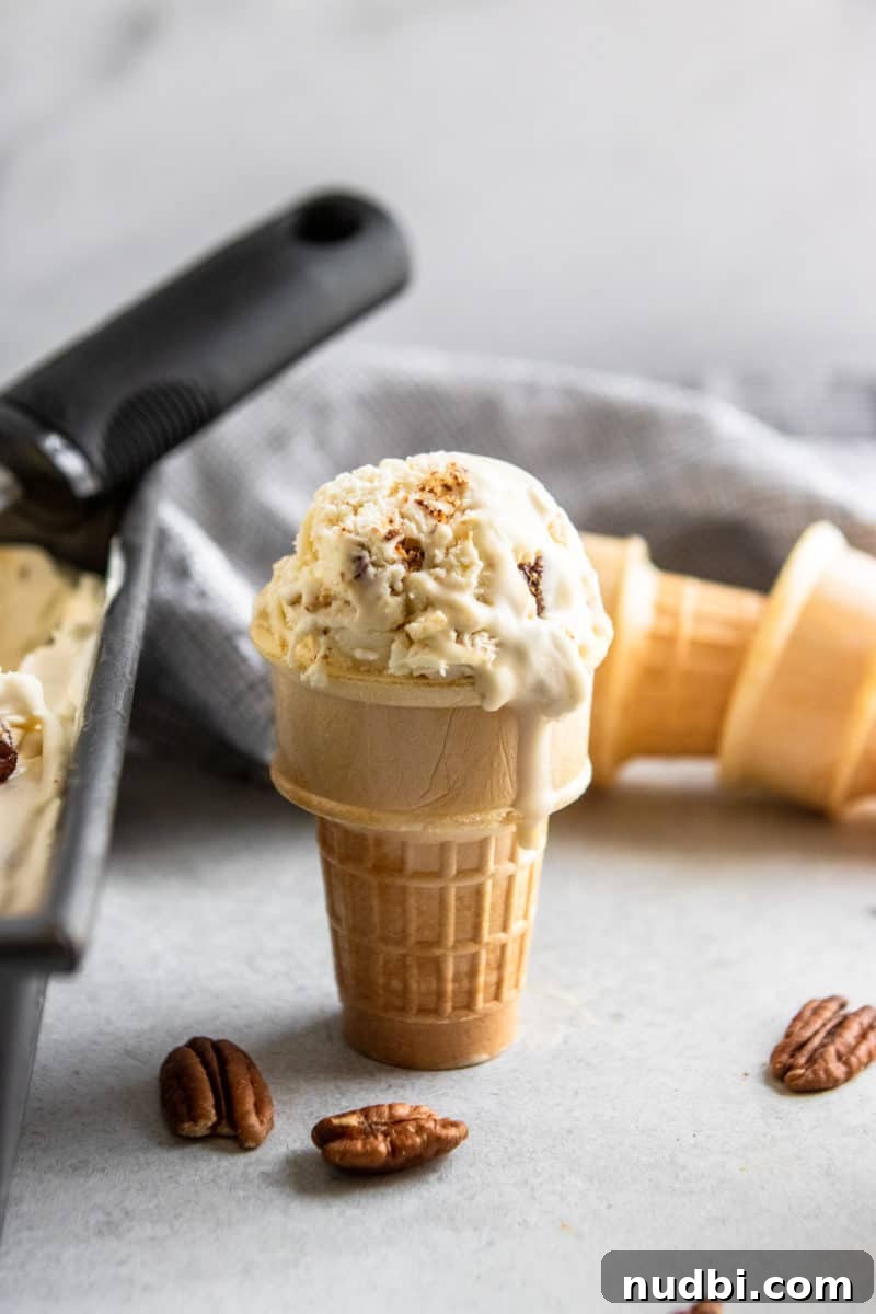 Homemade Butter Pecan Ice Cream Recipe You'll Love 4 Ice cream cone with butter pecan ice cream homemade and cones.