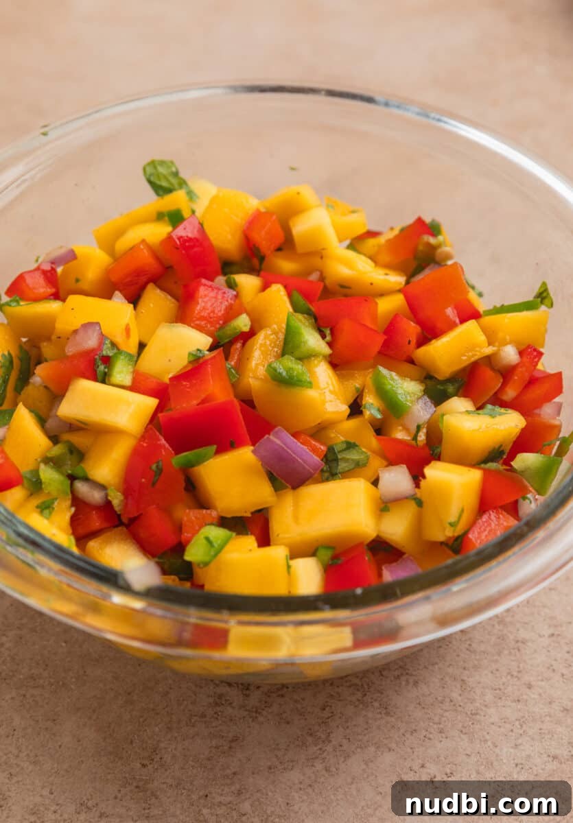 Grilled Chicken with Fresh Mango Salsa Recipe 7 Mango salsa in glass bowl.