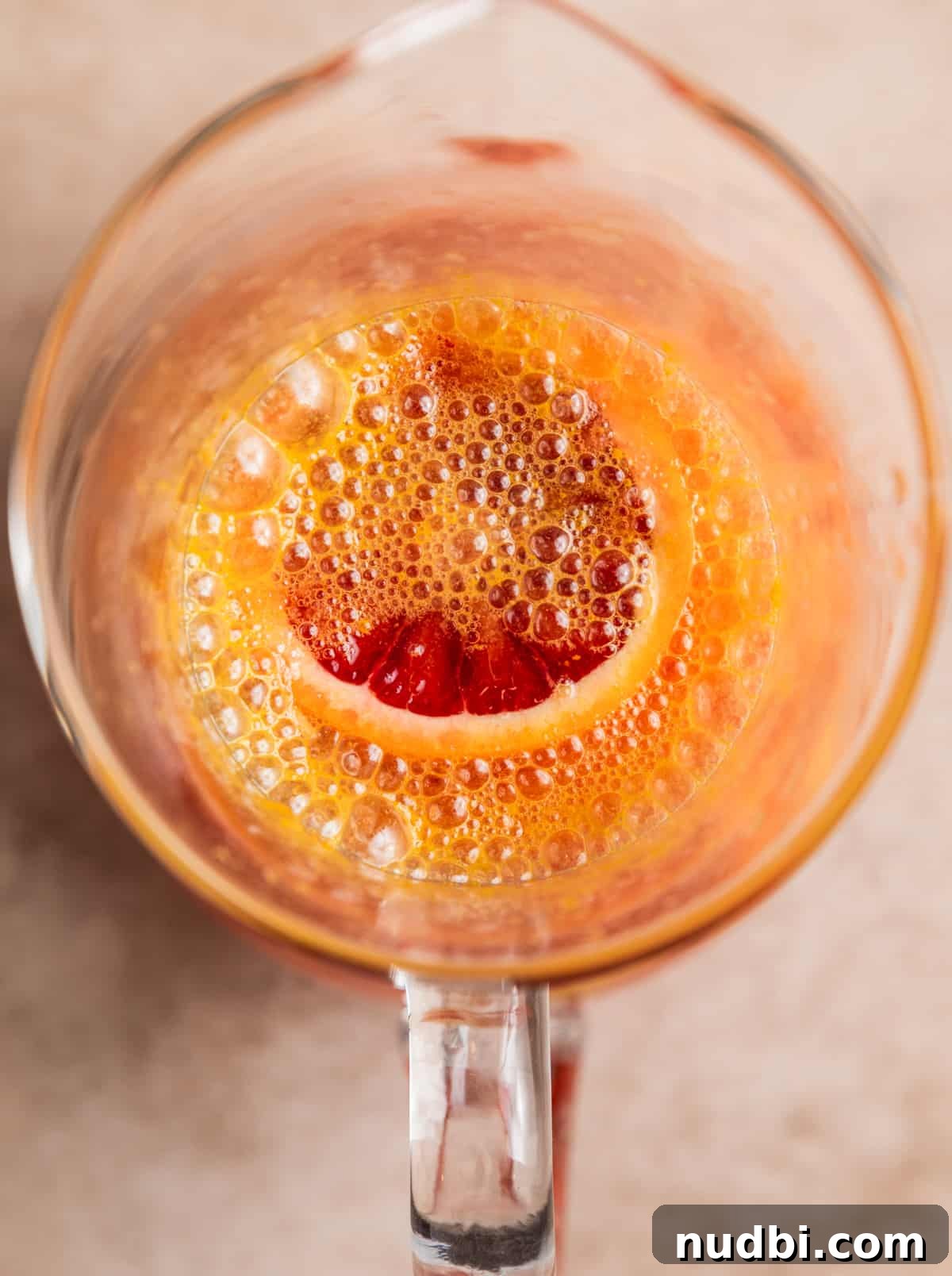 Blood Orange Champagne Sangria Recipe for Sparkling Brunch Drinks 7 Pitcher with blood orange sangria, champagne just added.
