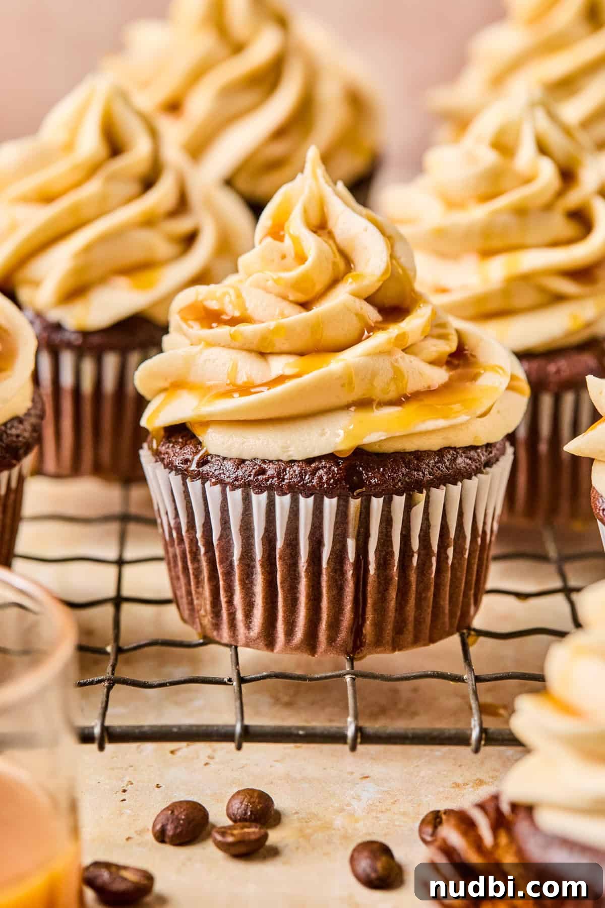 Salted Caramel Mocha Cupcakes Recipe for Coffee Lovers 2 Mocha cupcakes with salted caramel buttercream topped with caramel sauce.