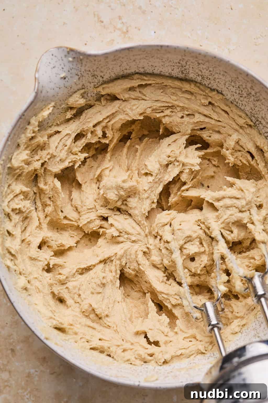 Oreo Chocolate Chip Cookies Recipe — Crispy Edges, Chewy Center 7 Creamed butter and sugar in mixing bowl with hand mixer propped.