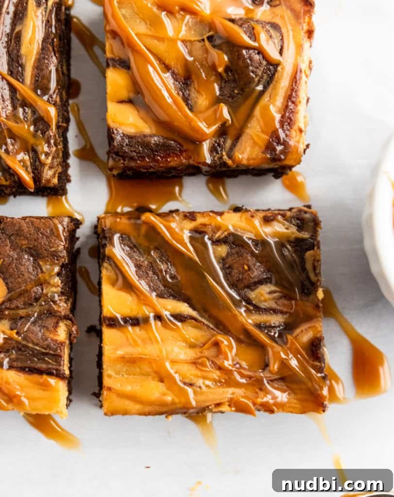 Dulce de Leche Cream Cheese Brownies Recipe for Gooey Bars 5 Close up of Cheesecake swirl brownies with dulce de leche drizzle