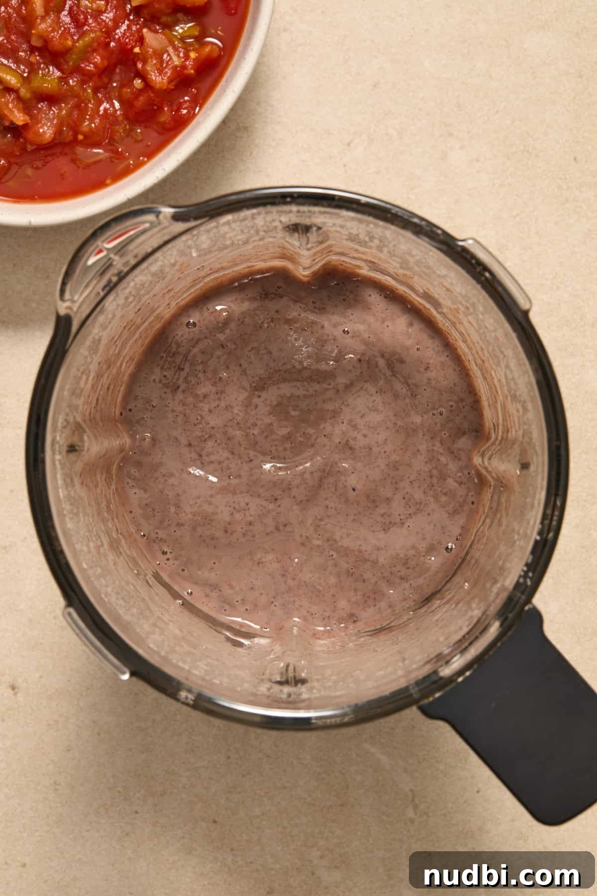 20-Minute Hearty Black Bean Soup Recipe for Weeknight Dinners 5 Beans blended in food processor before adding salsa.