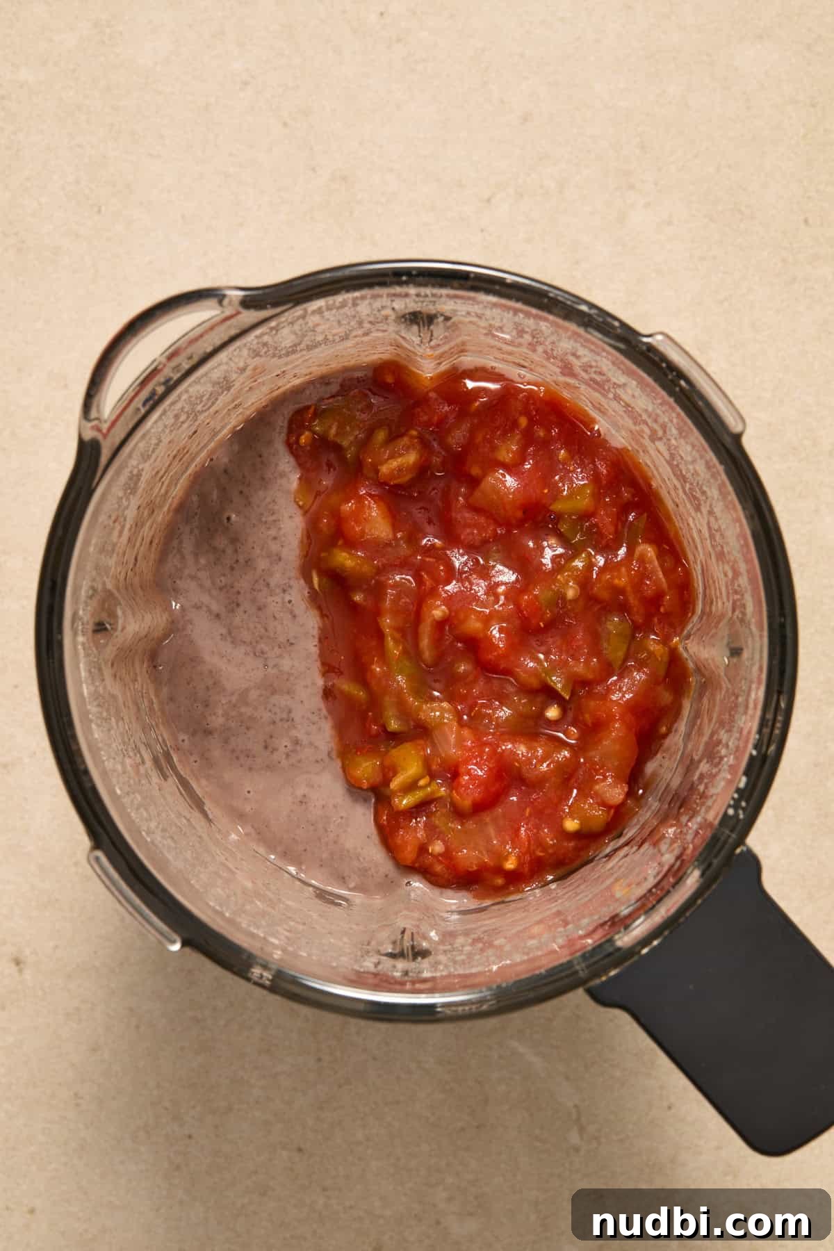 20-Minute Hearty Black Bean Soup Recipe for Weeknight Dinners 6 Salsa added to food processor and blended in with black bean mixture.