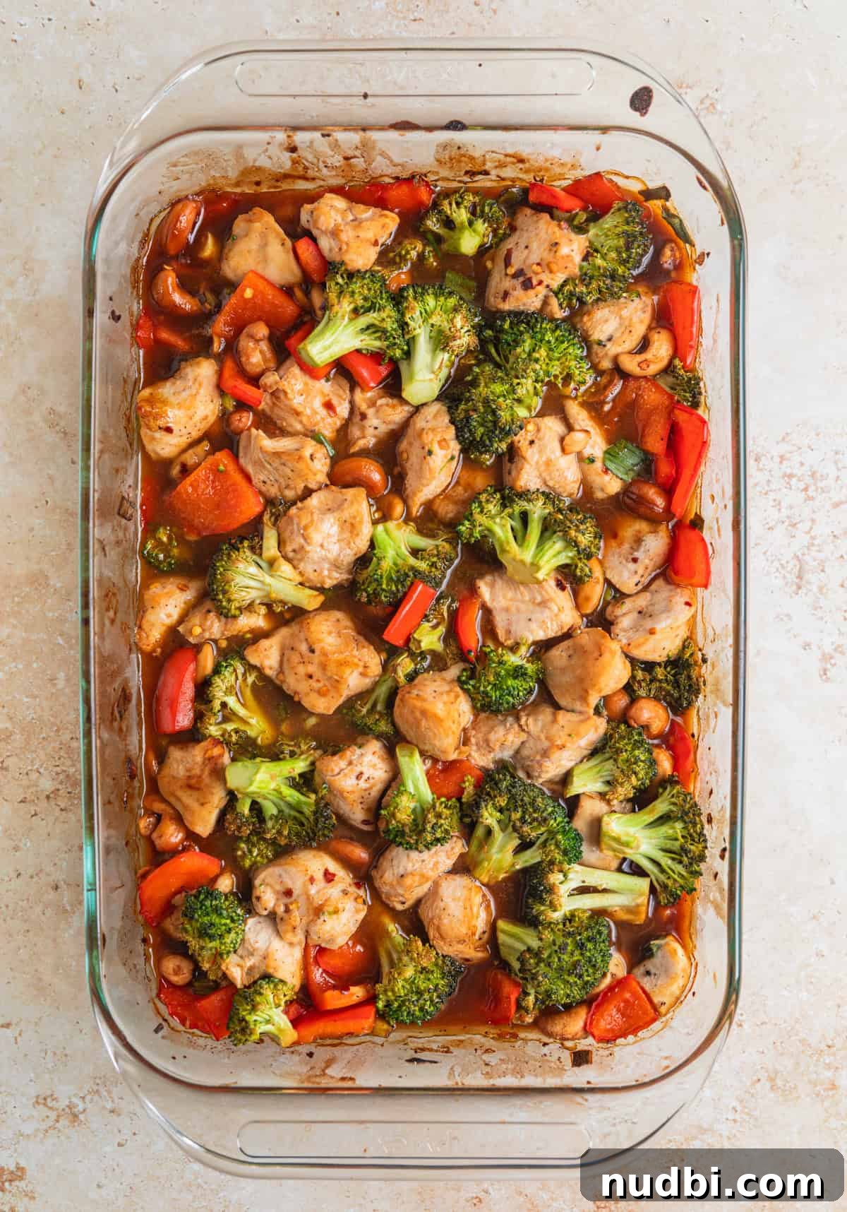Crispy Baked Cashew Chicken with Garlic Soy Glaze 8 Baked cashew chicken in pan right out of the oven.