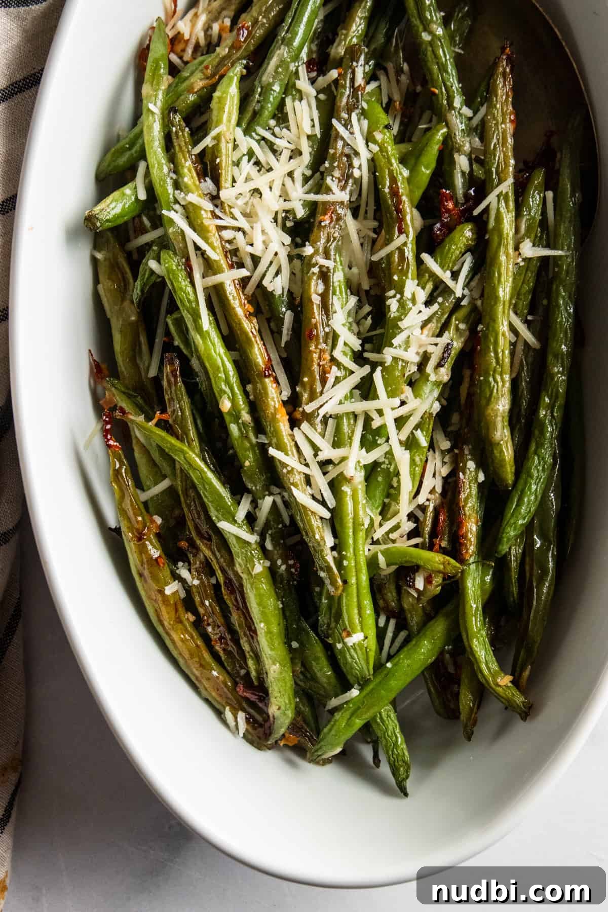 Crispy Roasted Parmesan Green Beans Recipe for Weeknight Dinner 3 Roasted green beans in serving bowl.