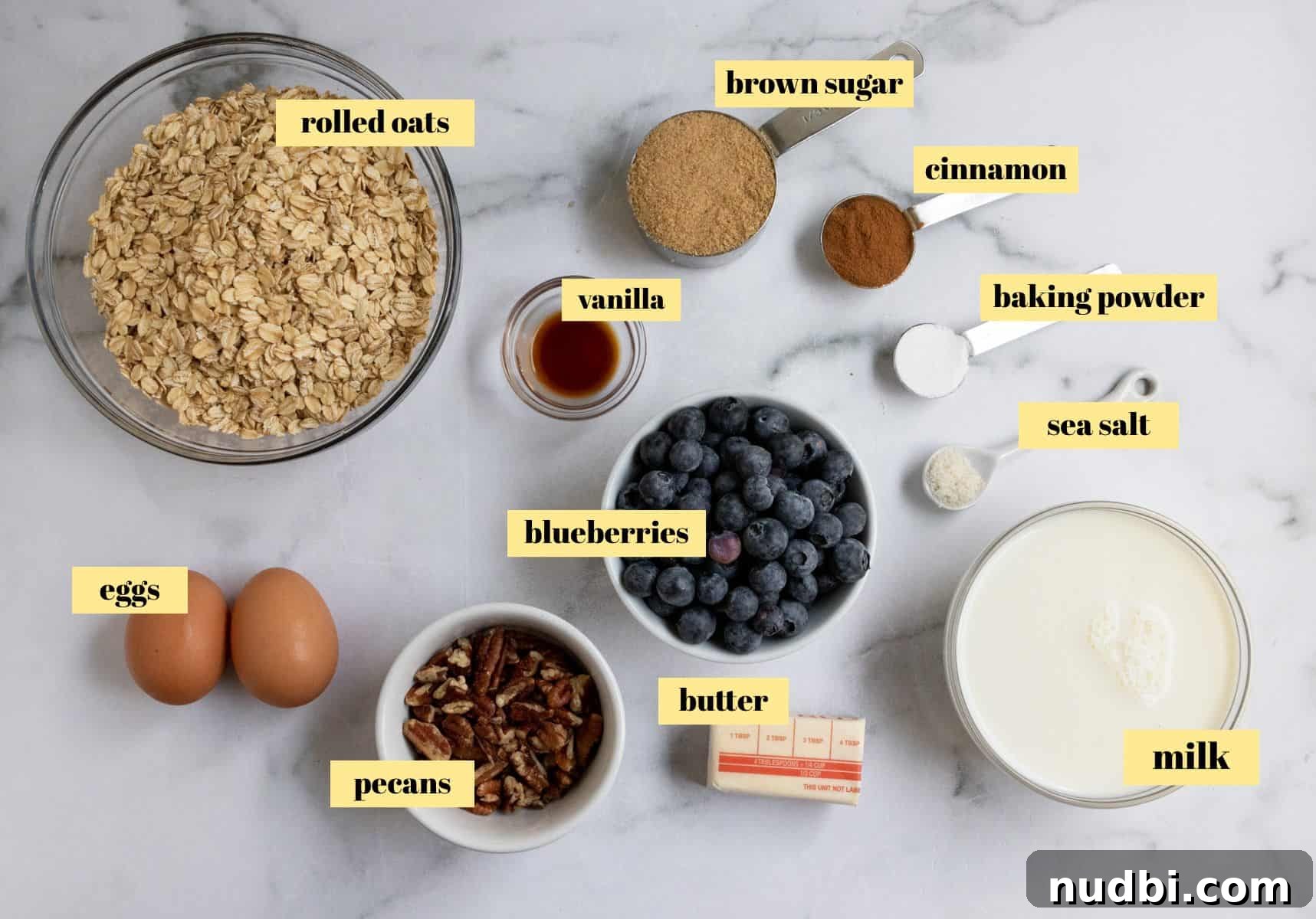 Blueberry Baked Oatmeal Recipe for Cozy Breakfasts 3 Labeled ingredients laying on a counter.