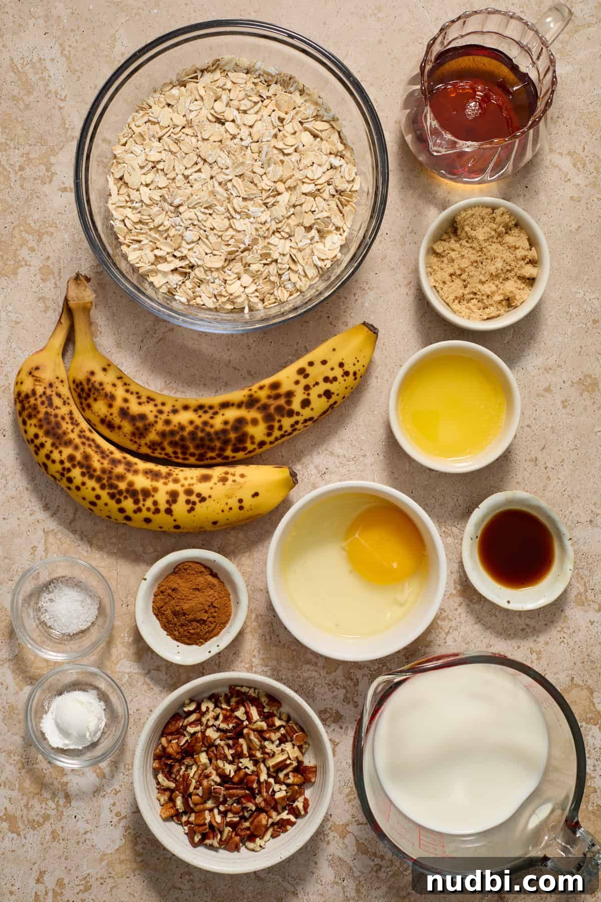 Banana Bread Baked Oatmeal Recipe for Breakfast and Meal Prep 3 Brown bananas, egg, butter, and other ingredients needed to make recipe.