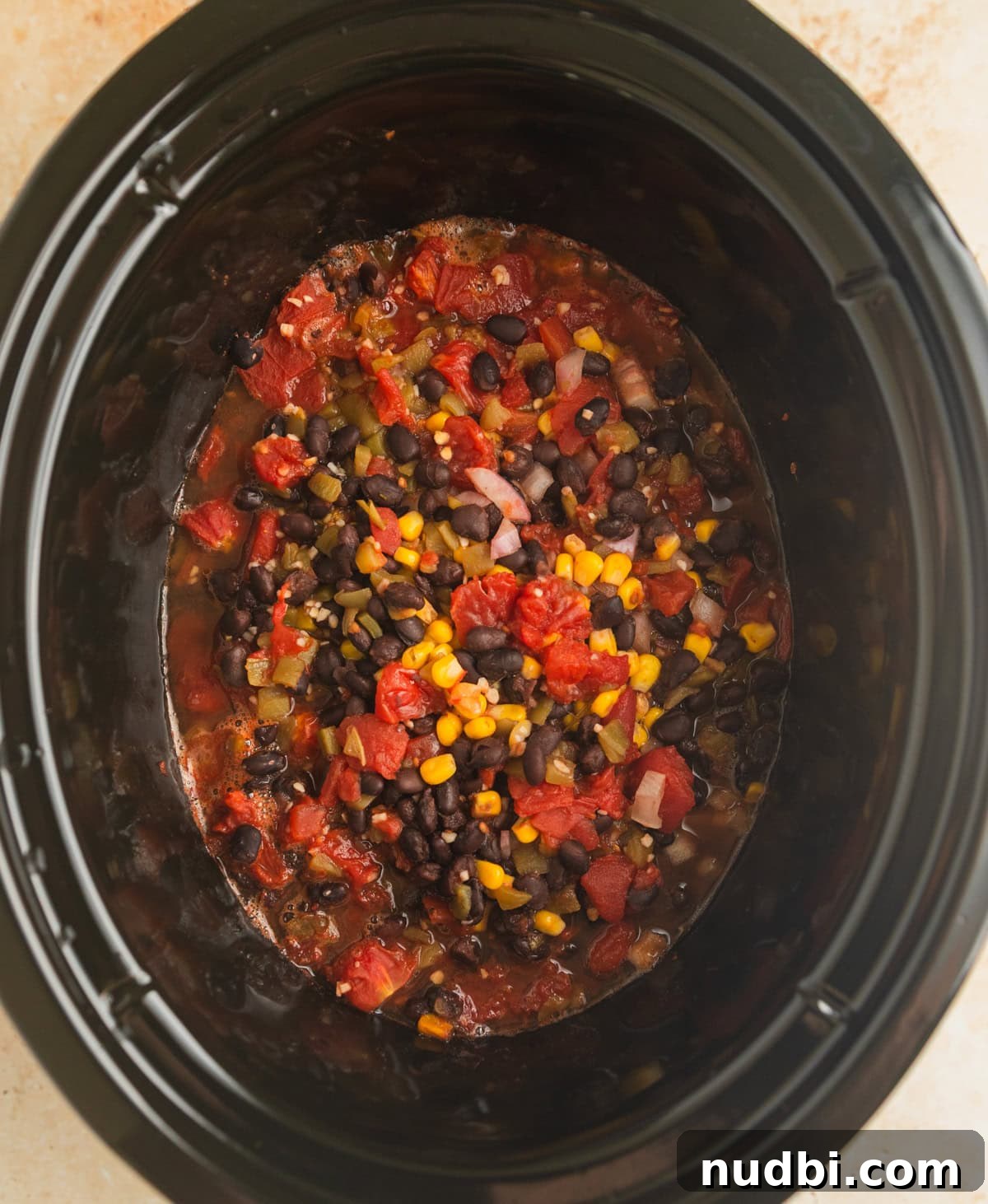 Slow Cooker Chicken Burrito Bowl: Flavorful Make-Ahead Recipe 6 Cooked crockpot chicken burrito bowl mixture before shredding chicken.