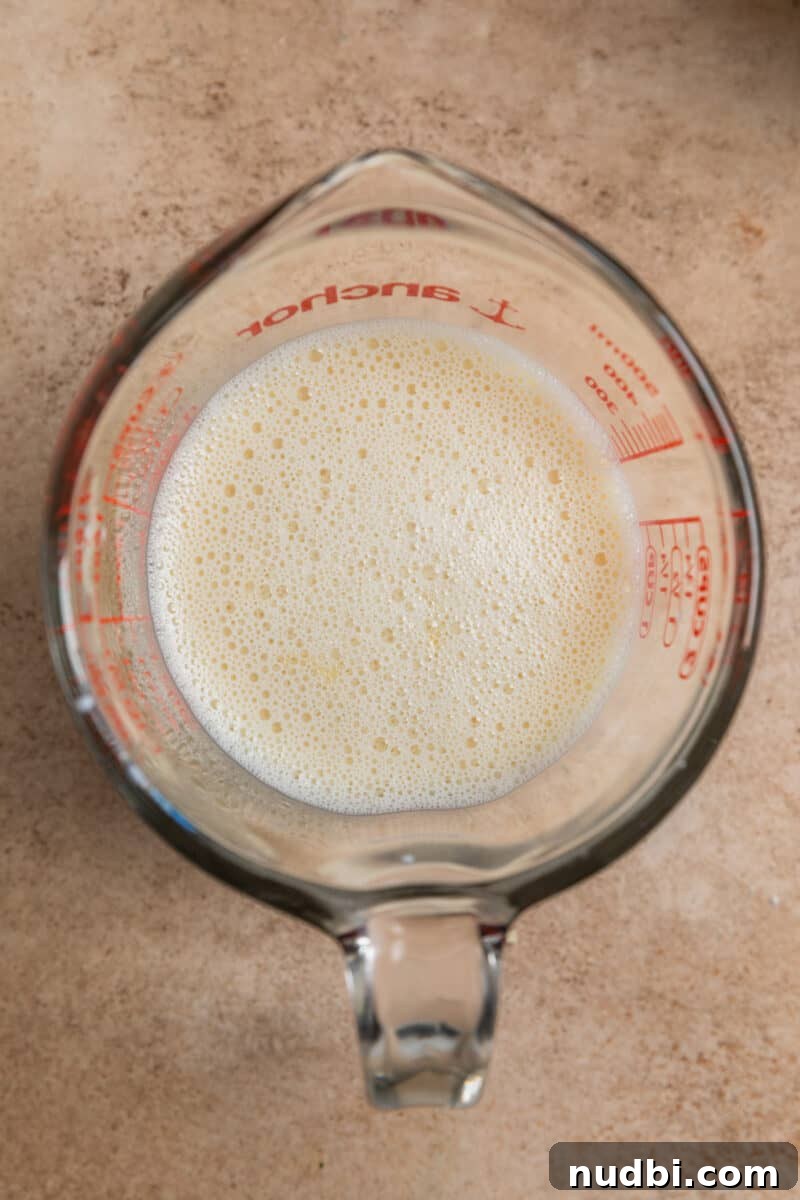 Honey Biscuits Recipe: Soft, Buttery Honey Biscuits in 30 Minutes 6 Honey and milk mixture in glass measuring cup.