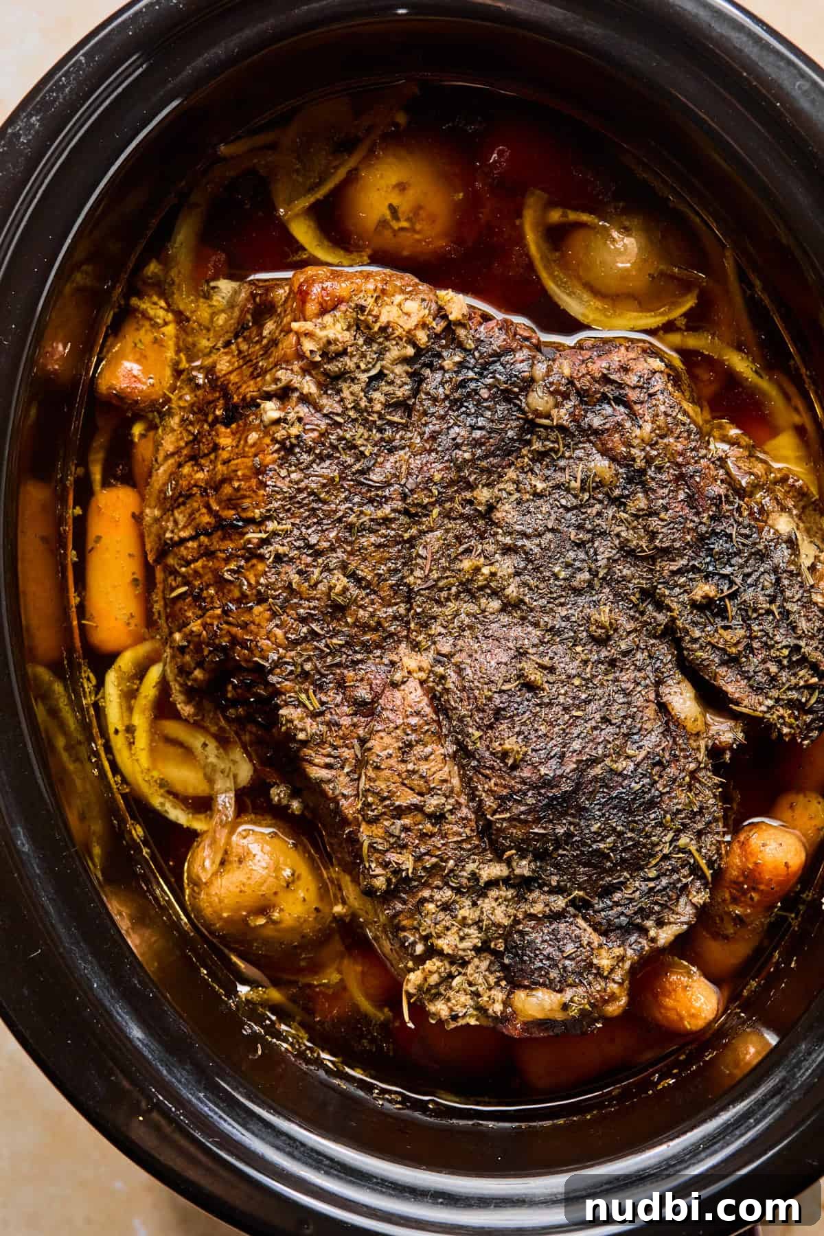 Slow-Cooked Chuck Roast Recipe for Tender, Juicy Beef 8 Cooked chuck roast in crock pot.