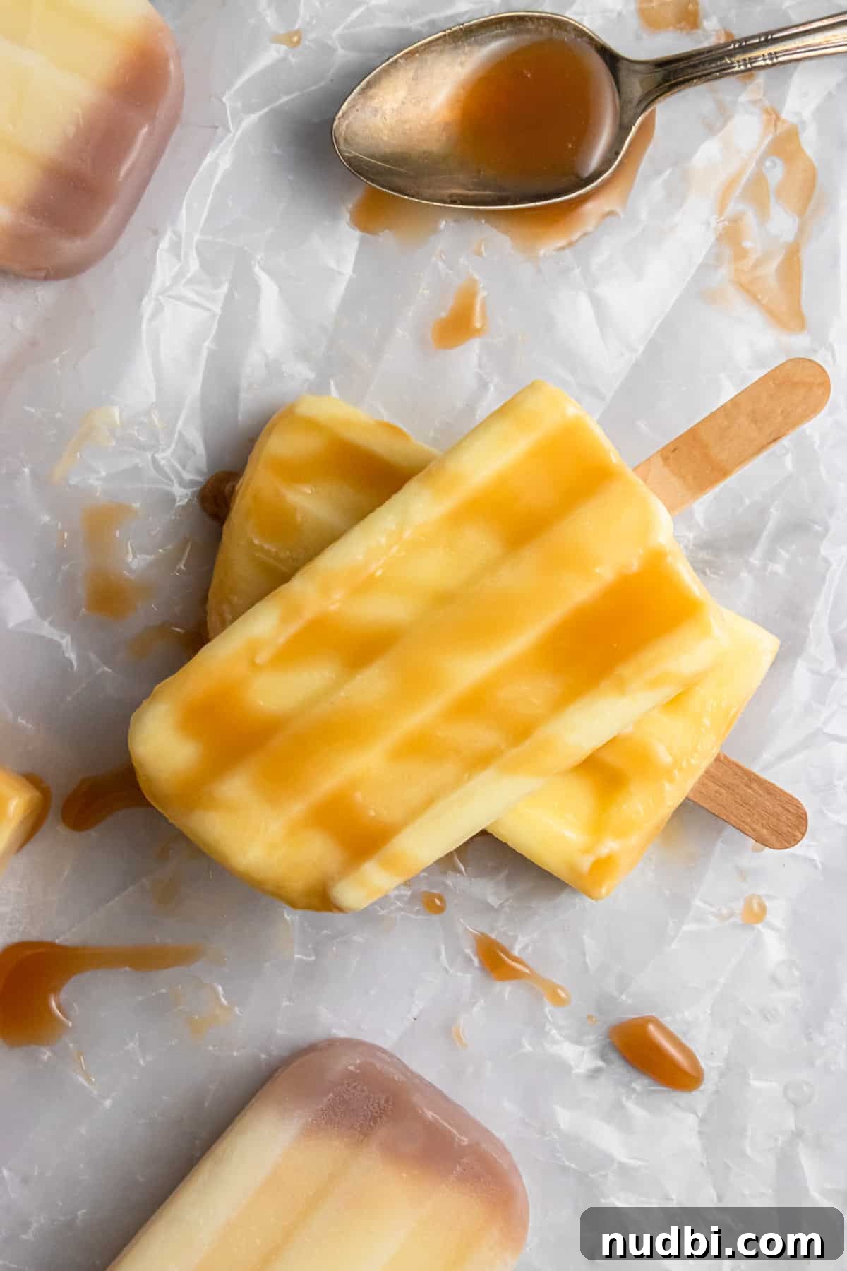 Homemade Jello Pudding Pops: Creamy Frozen Treat Recipe 5 Overhead shot of pudding pops with caramel.