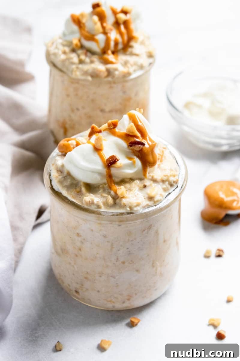 Peanut Butter Greek Yogurt Overnight Oats Recipe for Creamy Breakfast 2 Peanut butter greek yogurt overnight oats with peanut butter drizzle.