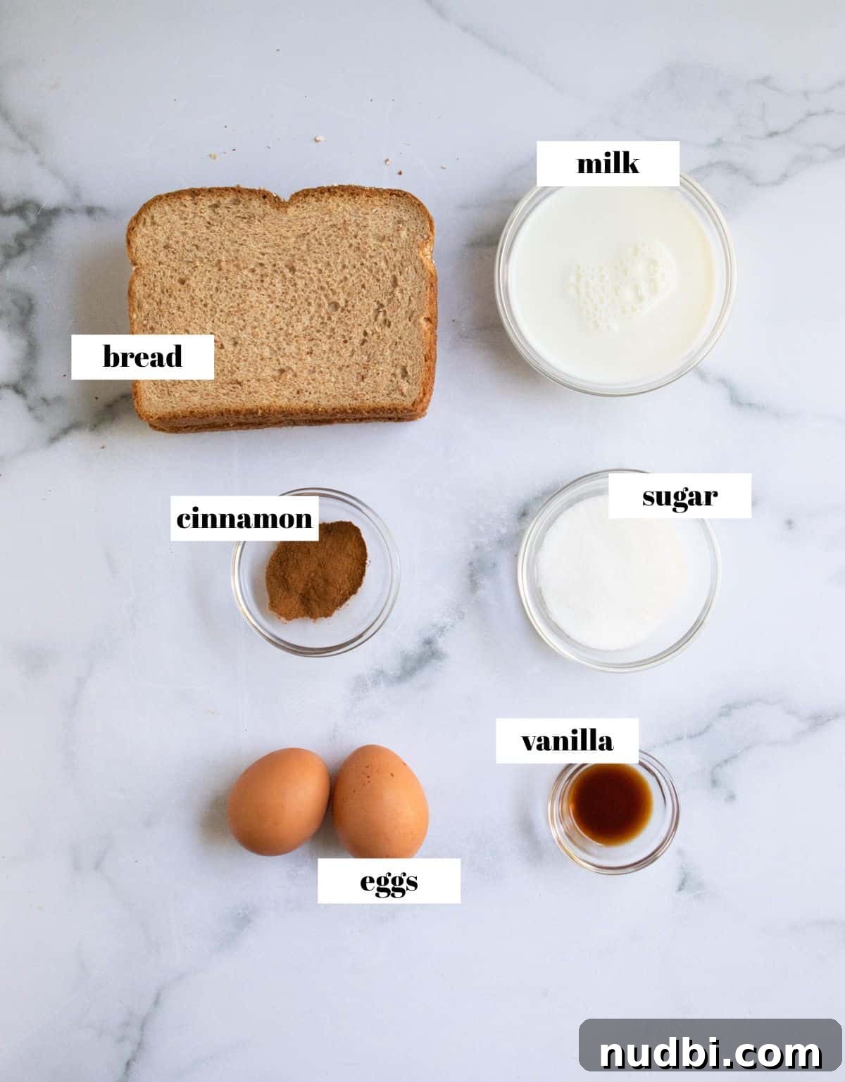 Crispy Air Fryer French Toast Sticks Recipe 4 Bread, eggs, vanilla, sugar and cinnamon labeled on white
