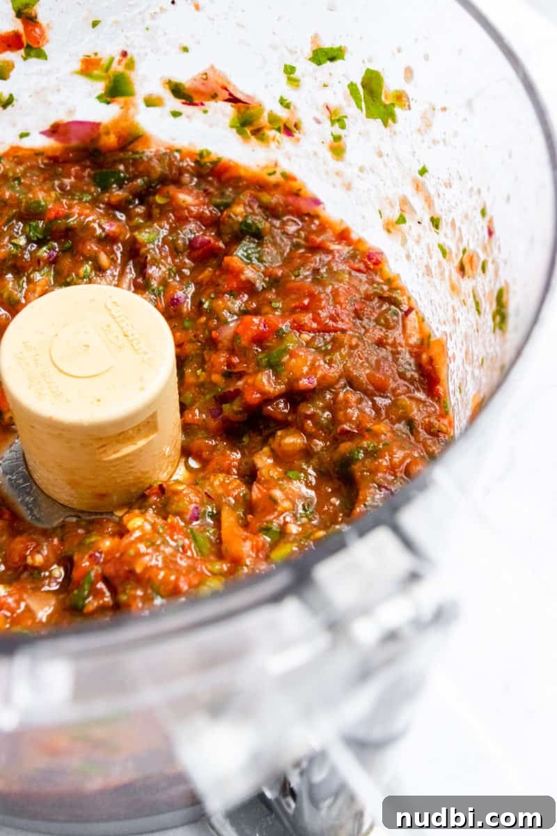 Smoky Roasted Tomato Salsa Recipe for Fresh Homemade Salsa 6 Roasted Tomato Salsa in food processor.