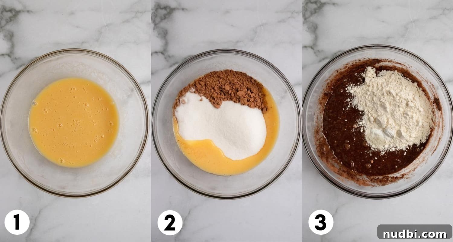 Skillet S'mores Brownie Recipe: Gooey Campfire Dessert 4 Butter eggs, cocoa and flour mixed in a mixing bowl.