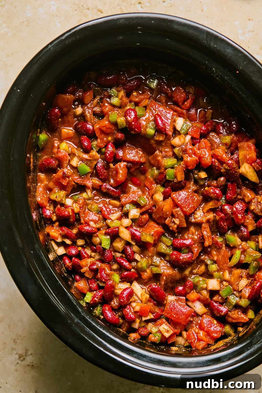 Slow Cooker Beef Brisket Chili Recipe for Tender, Smoky Flavor 8 Slow cooker beef brisket chili recipe before cooking in crockpot.