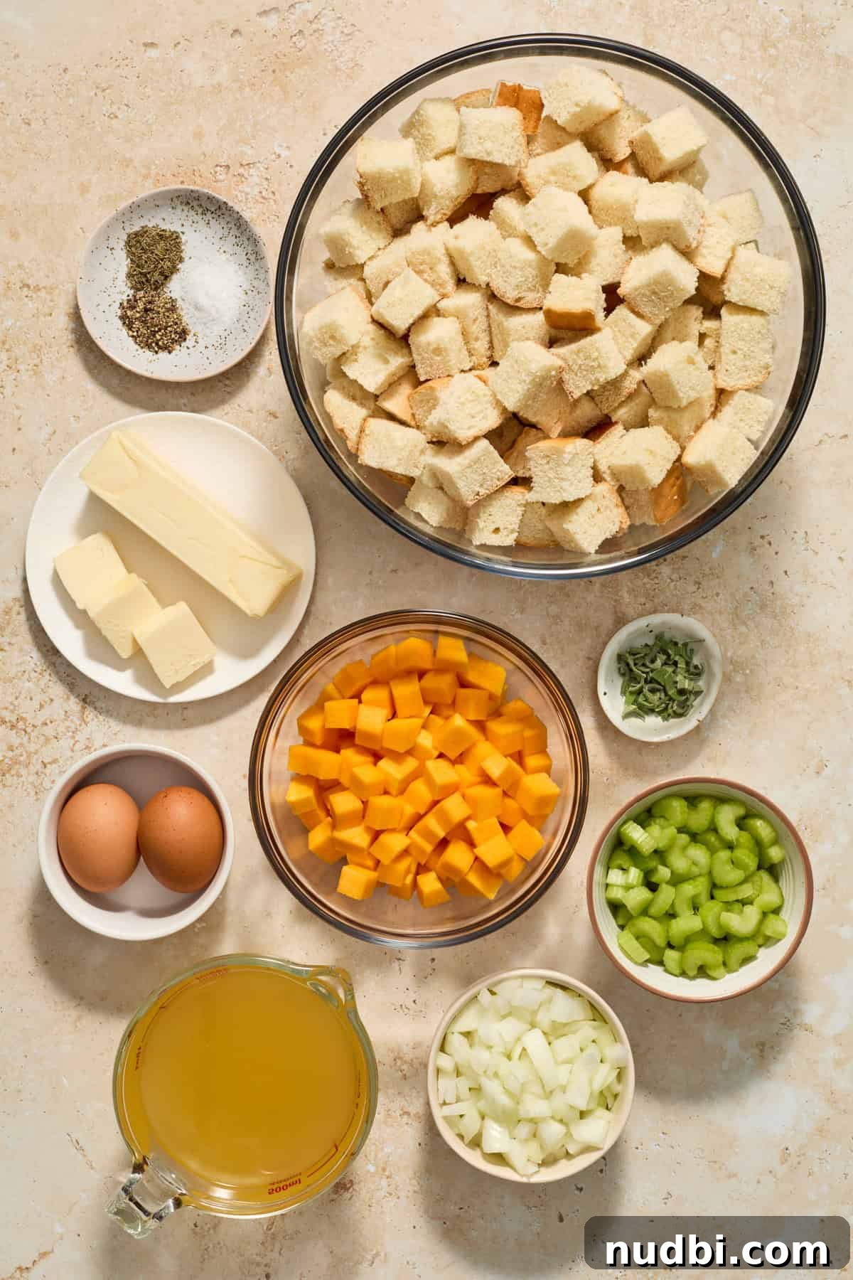 Savory Butternut Squash Stuffing Recipe for Holiday Dinners 3 Bread, celery, broth, butter and other ingredients.