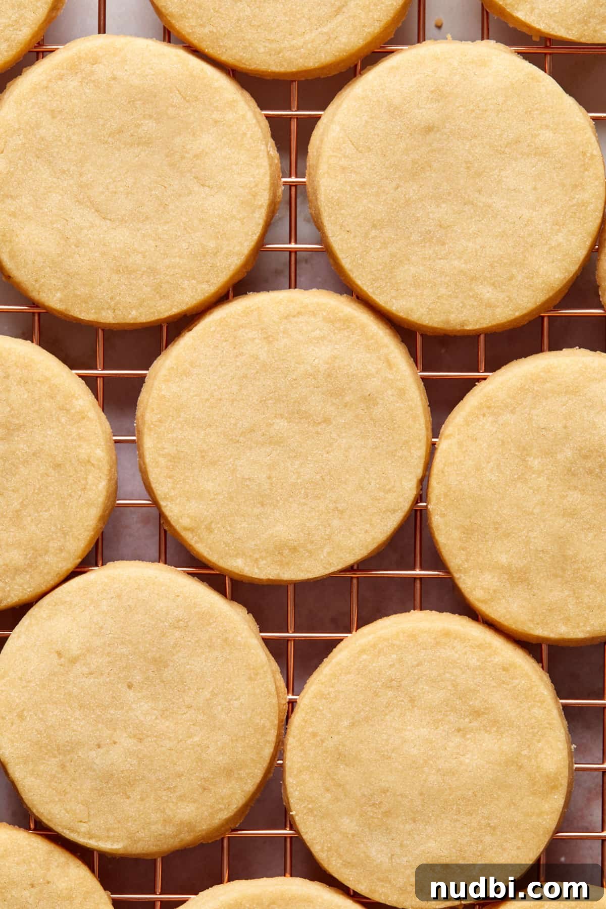 Classic Christmas Shortbread Cookies Recipe for the Holidays 11 Baked shortbread cookies on cooling rack.