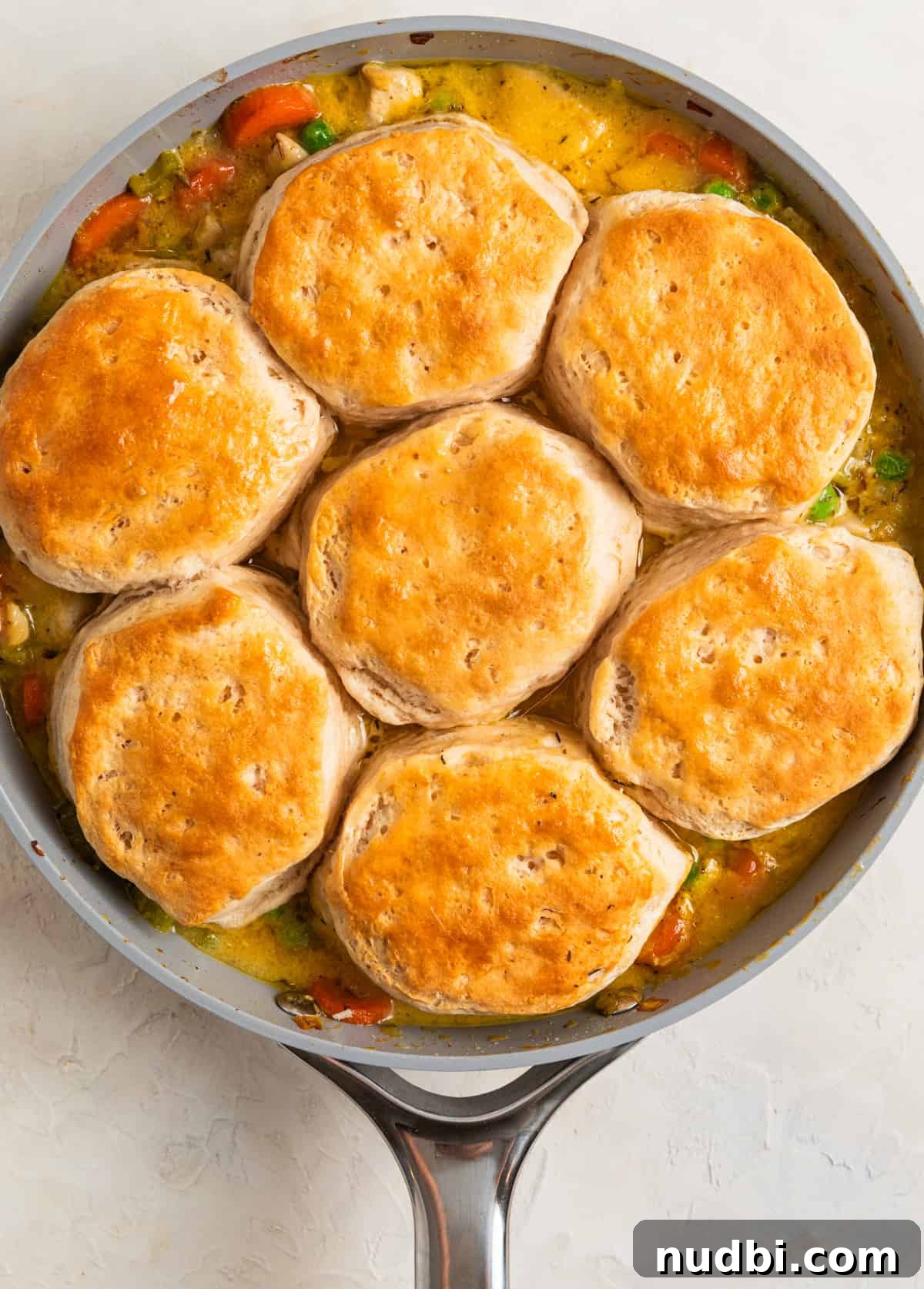 One-Pan Chicken and Biscuits Skillet Recipe 9 Baked chicken and biscuit skillet.
