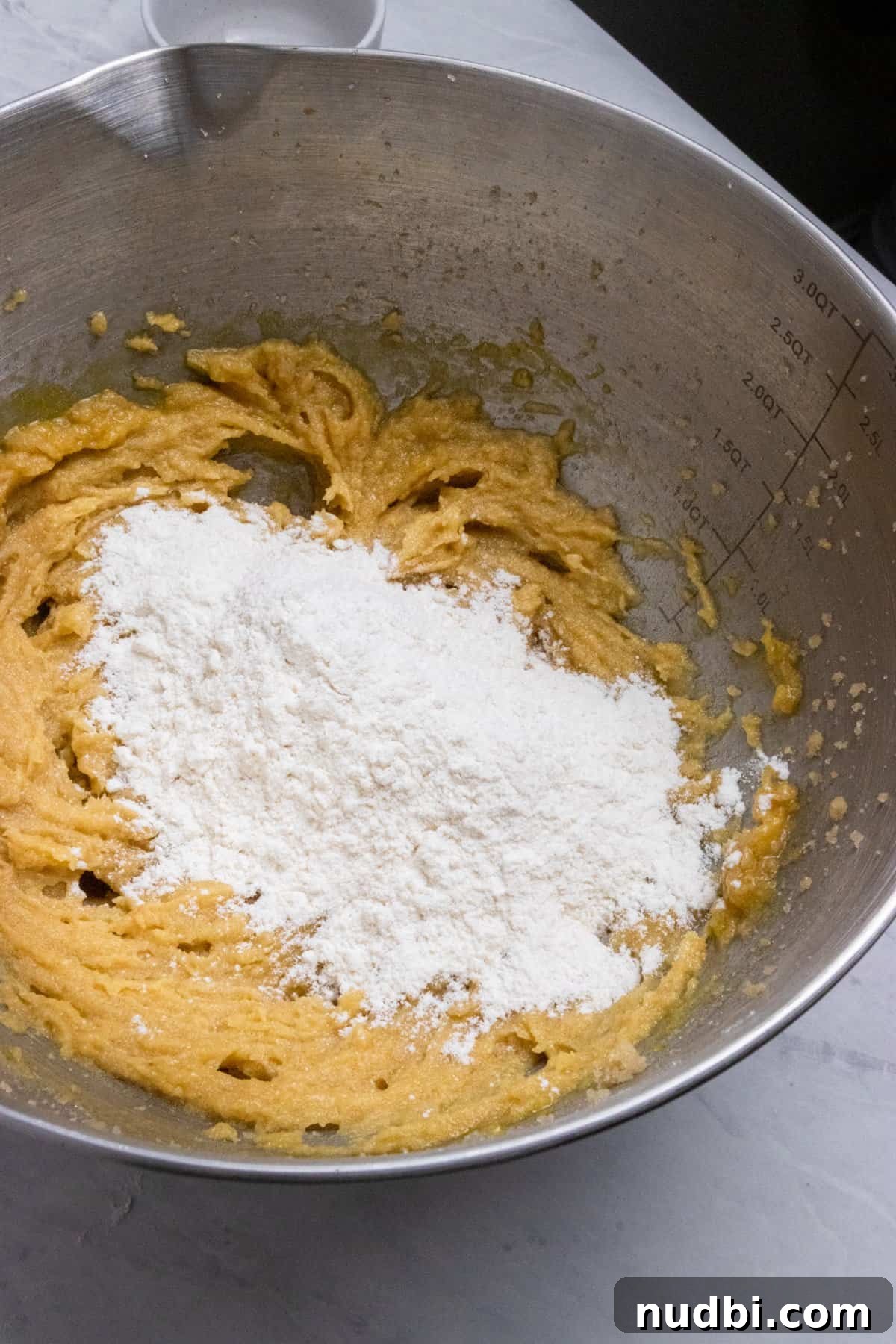 How to Make Lucky Charms Cookies (St. Patrick’s Treat) 6 Flour and dry ingredients added to mixing bowl.