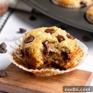 Banana Coconut Muffins with bite taken.
